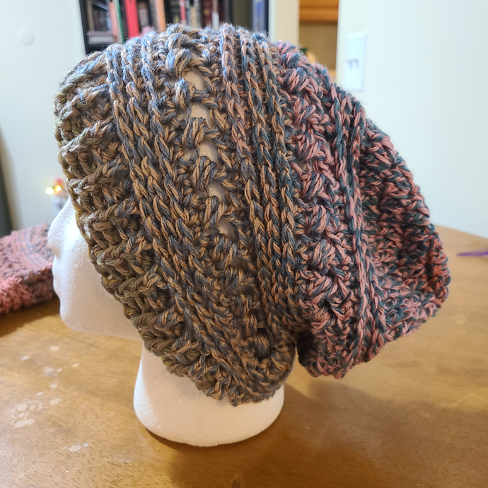 Slouchy Hat. Crocheted variegated yarn in blue and pink. 