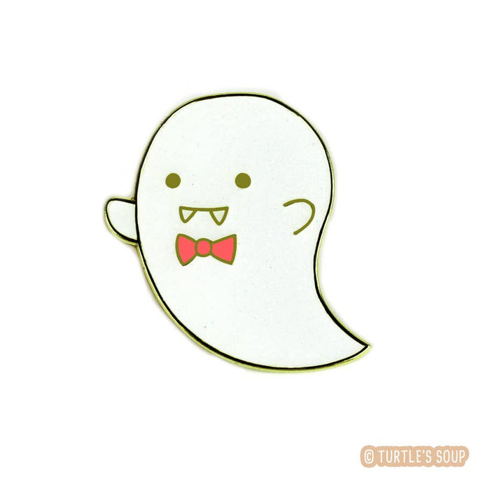 Enamel pin depicting a stylized ghost with vampire teeth and a red bowtie.