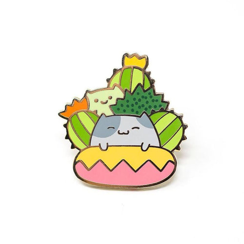 Enamel pin depicting stylistic happy cats and cacti.