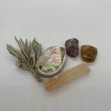 Load image into Gallery viewer, Clockwise from left: sprig of sage, Shell with mother-of-pearl sheen, Lepidolite stone, Citrine stone, Orange Selenite stick.
