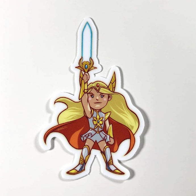 an image of the 2018 reboot She-ra, holding her sword up triumphantly